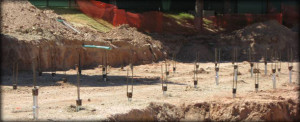 Picture of helical piles with rebar caps. 