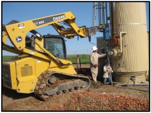 Installation process for helical piles used to level settling equipment.