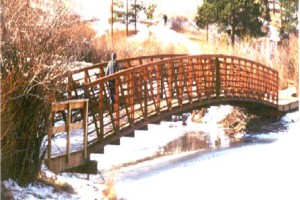 Pedestrian, golf cart, and vehicle bridges can all be supported on helical piles