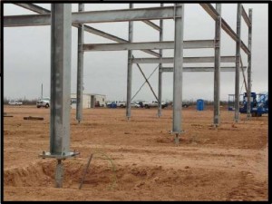 Pipe rack installed before the foundations are poured. Allows for mechanical construction to start even if you haven't gotten out of the dirt. Excavation for footer can be seen in picture.