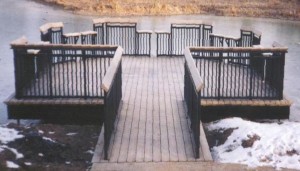 Fresh water fishing dock installed on helical piles.